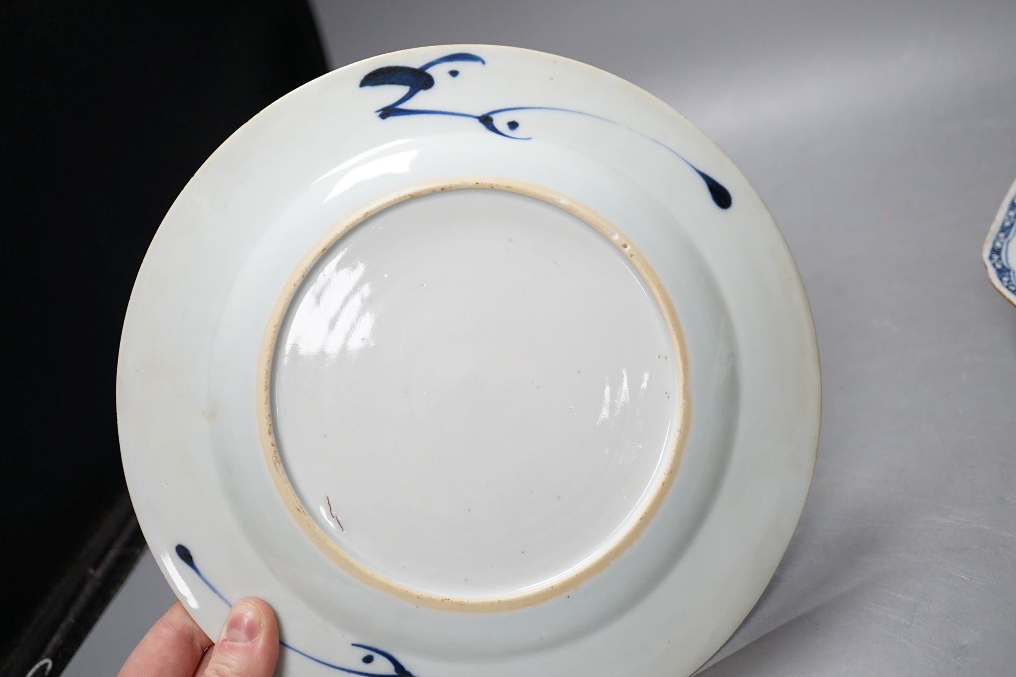 A Set of six 18th century Chinese export blue and white ‘bird in a cage’ small plates, 6.3 cm diameter and two pairs of 18th century Chinese export blue and white plates dishes, largest 23cm diam (10)